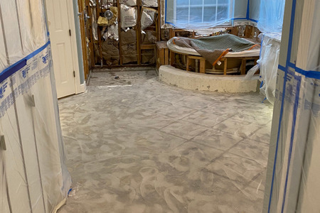 After image of master bathroom floor removal 