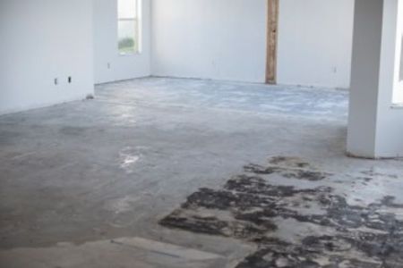 tile floor removed in a dining room of a home