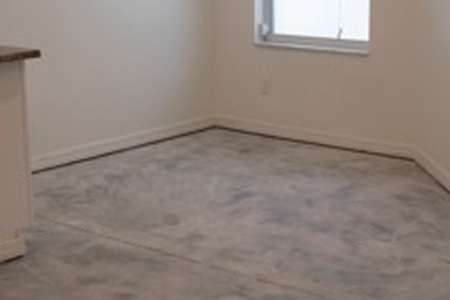 floor in a breakfast nook after dustless tile removal process