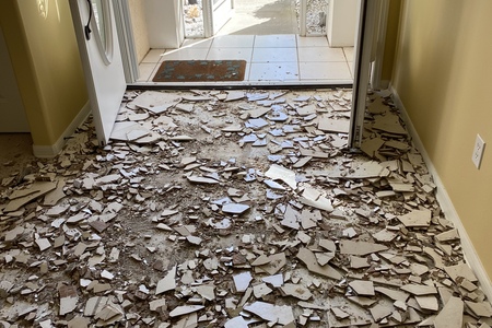 during tile removal of entryway in viera home