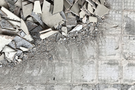 Concrete Floor with Broken Up Tile and Dust
